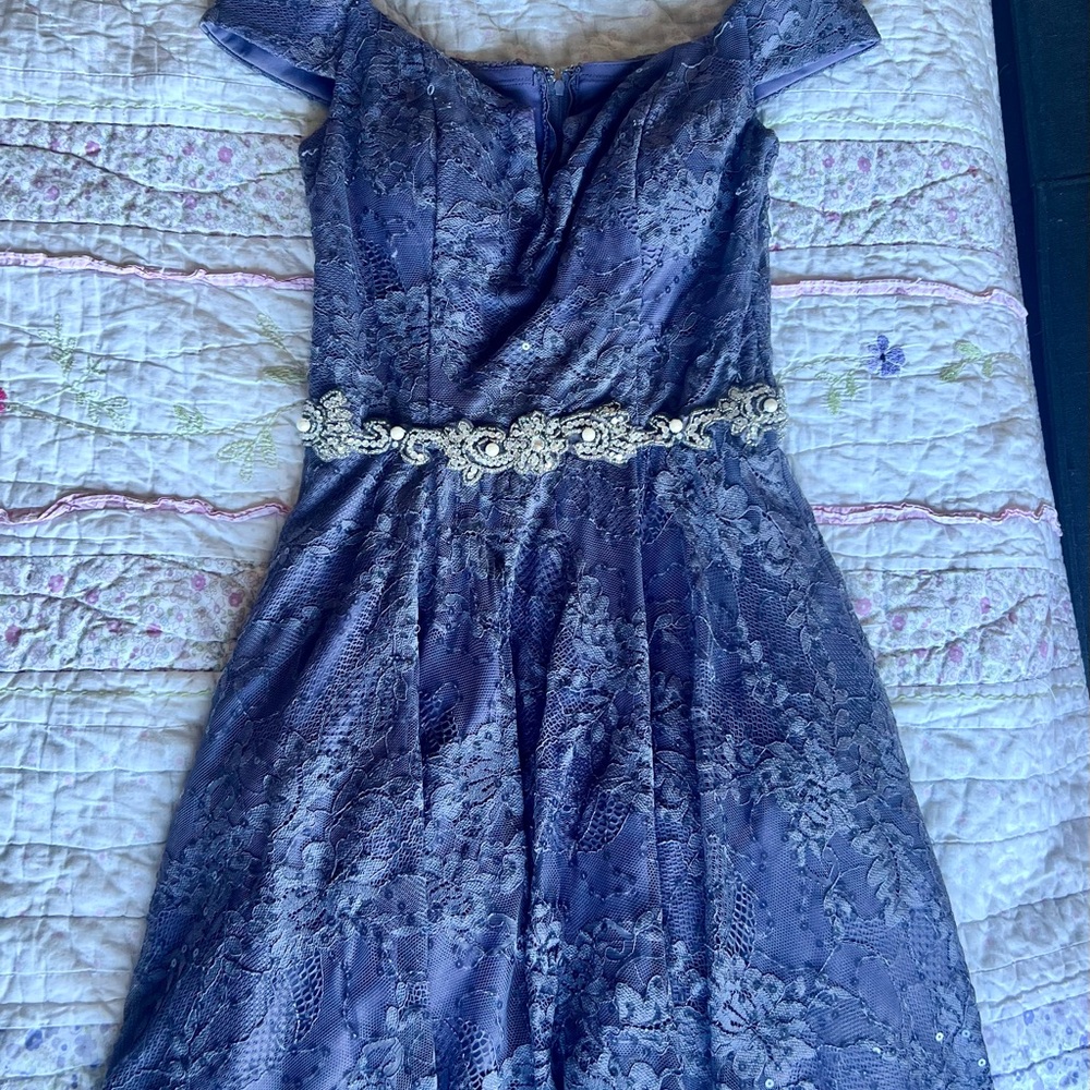 Teen girl dress. Used only one time for homecoming. Small loose thread in front.